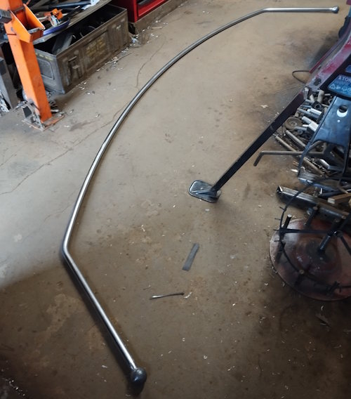Curved curtain pole in the workshop under construction